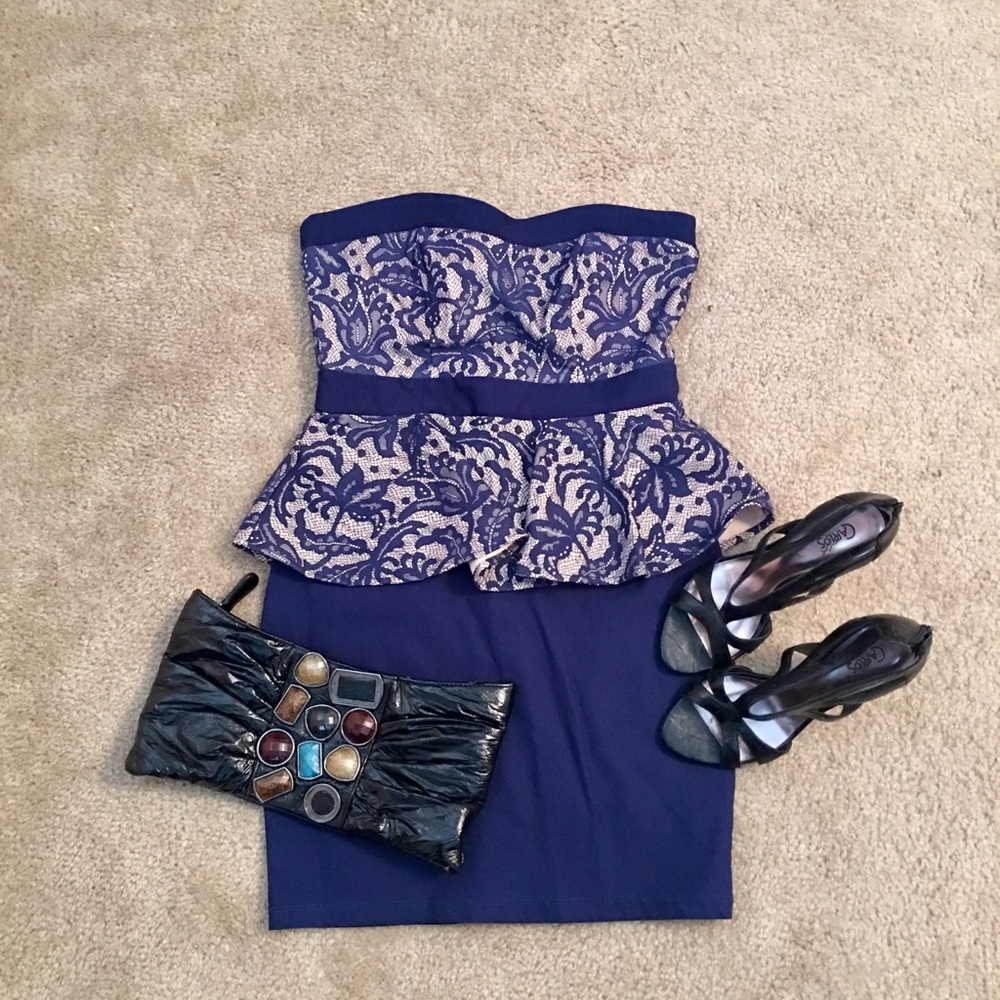 Strapless peplum dress with lace overlay. Very flattering on.